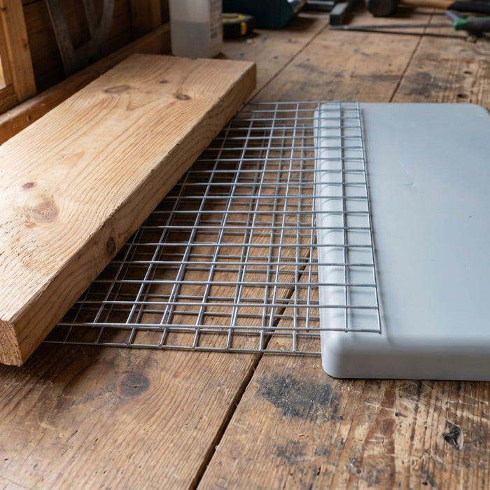 Wood plank, metal wire mesh and plastic panel side by side